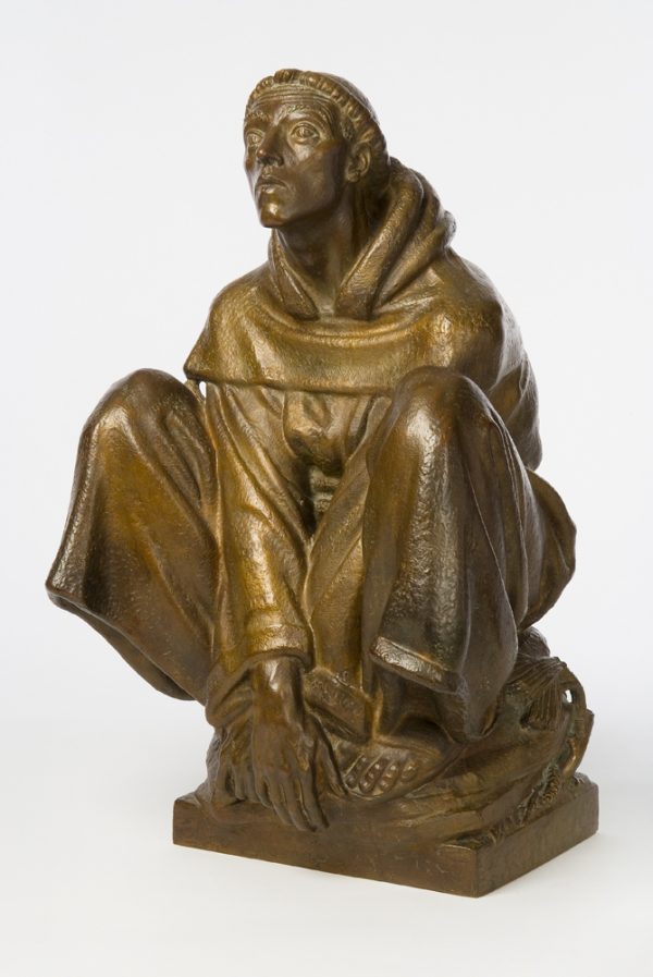 Saint Francis is squatting with his hands on his feet. His gaze is looking up.
