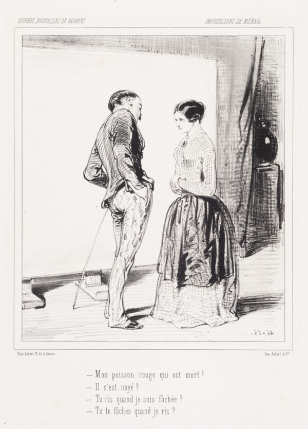 A man and woman face each other. The man leans on his cane and the woman stands with hands clasped. Both are in front of a white screen.