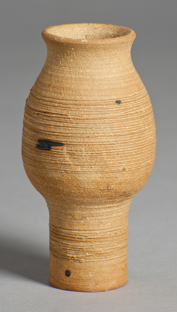 Small bottle with no glaze, tall foot