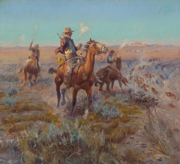 Three cowboys are herding cattle.
