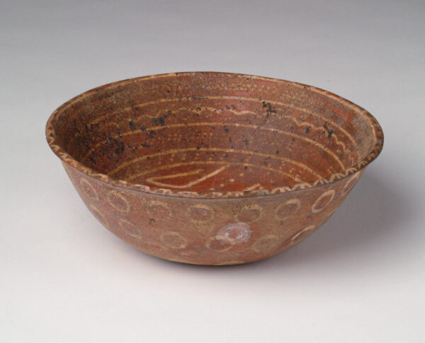 Bowl with geometric design in the flat bottom.