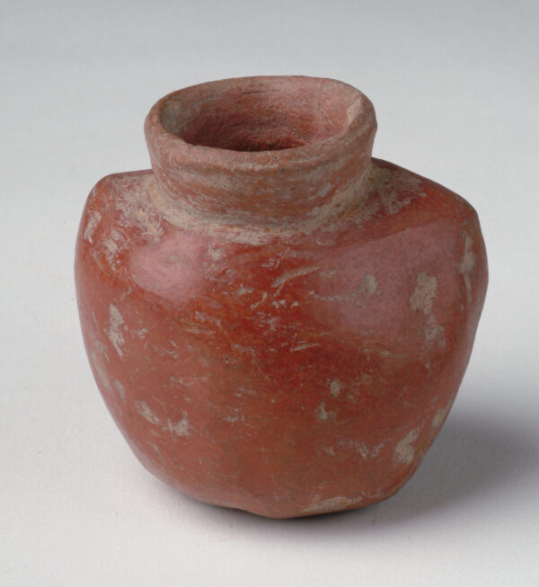 Red vessel with squared shoulders, narrow neck.