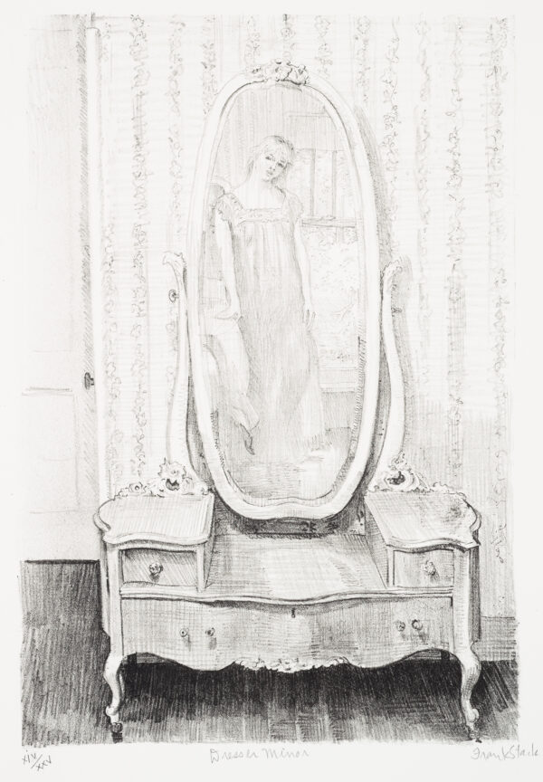 A low dresser with woman reflected in the oval mirror.