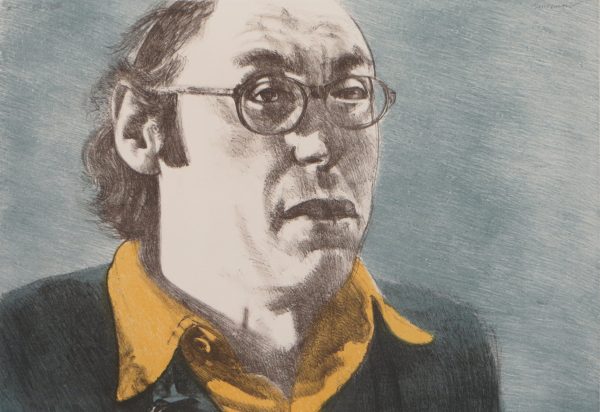 Portrait of a man; head & shoulders; with receding hairline, glasses,  yellow collar, green sweater.