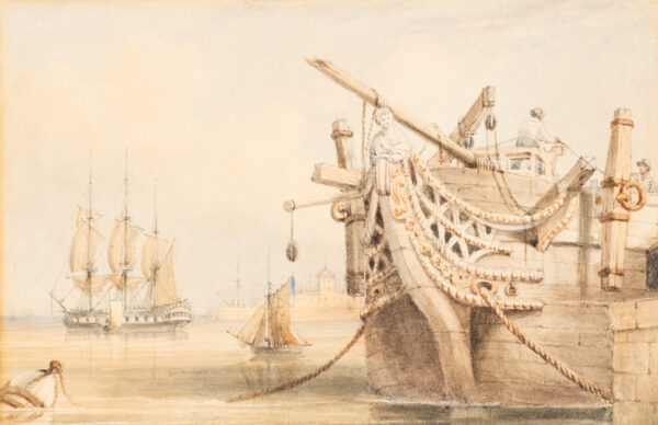 View of three shipping vessels in a harbor.