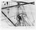 View of a ship's mast with rigging.