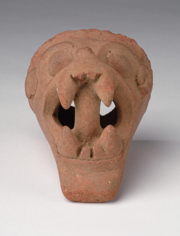 Animal head fragment from a vessel.