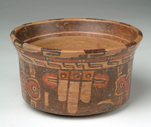 Flat bottom bowl: tan body with red and dark brown slip decoration.