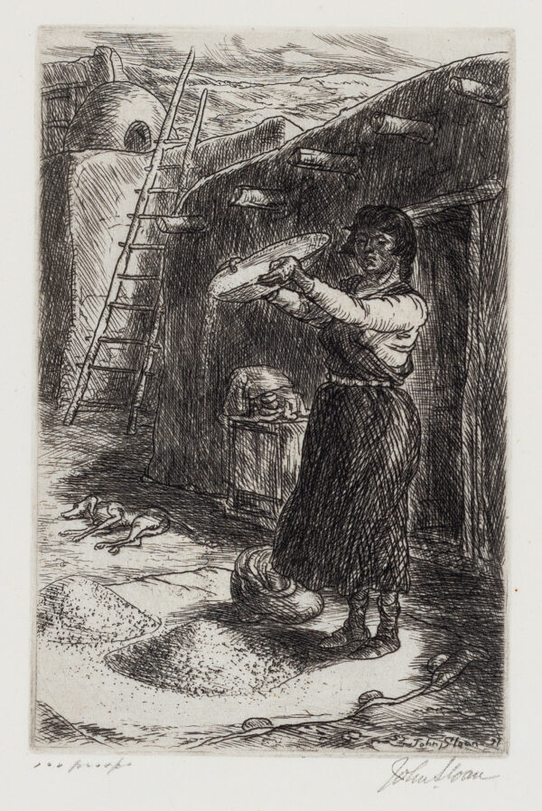 A woman stands in front of an adobe building with a small pile of wheat in front of her. She is winnowing by throwing the wheat into the breeze to separate the chaff from the seed.