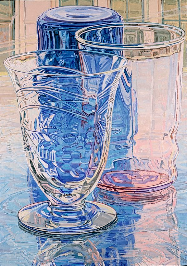 A still life of two glasses stand upright before an inverted blue glass. All three have multiple reflections.
