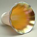 Shade flares from fitter rim to a scalloped edge; undulating gold (iridescent) interior; ribbed, cream colored exterior.