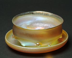 Gold iridescent glass finger bowl in the 