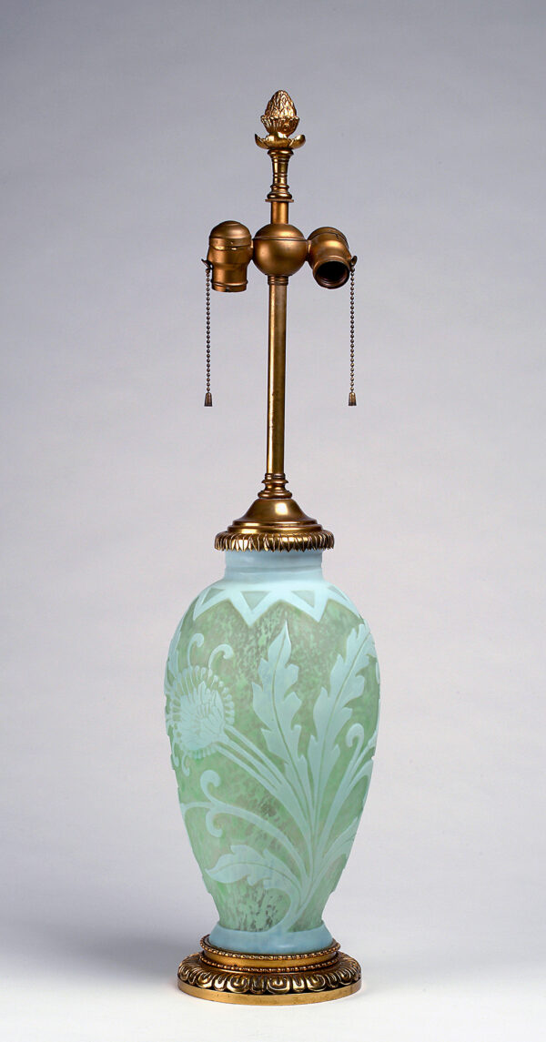 Carder designed vessels like this to function as a vase or to be fitted with mounts for use as a lamp. 