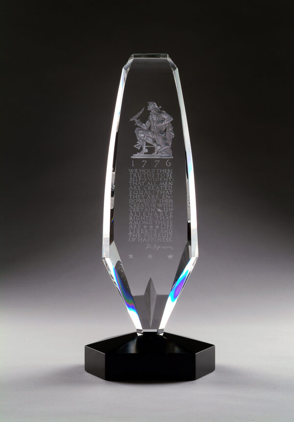Engraved obelisk with image of Thomas Jefferson.