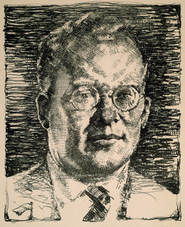 A bust portrait of a man with glasses and a tie.