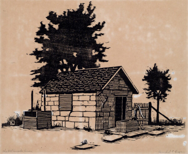 Depicts a small rock outbuilding with a pitcher pump and water trough in front of the doorway; two trees are shown behind the building.