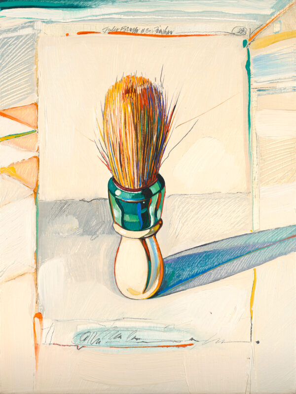 A shaving brush stood on it’s handle. There is orange triangles at left. The handle is white and green with multicolored hairs.
