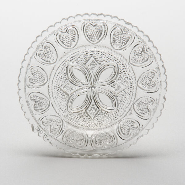 Clear cup plate with Quatrefoil pattern