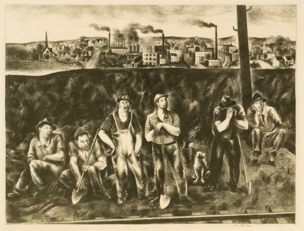 There are six men; three standing, three sitting with three shovels in front of a bank of earth. There is a dog. A rail road is in the foreground with a town and industrial smokestacks in the background.