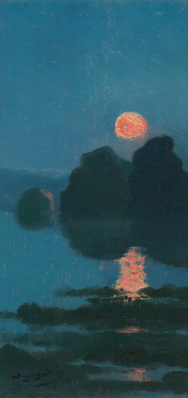 A sunset or sunrise. The sky is dark blue and the sun is orange hanging over a group of trees. This is reflected in a body of water.