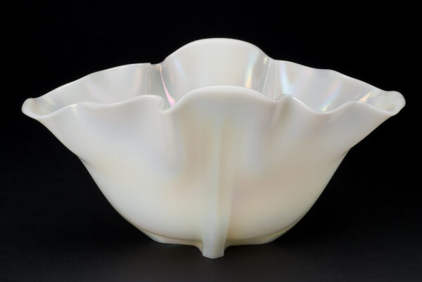 An Ivrene colored bowl with free form folds along the rim. #7535