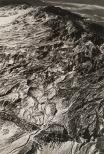 A patterned black and white mountainous landscape.