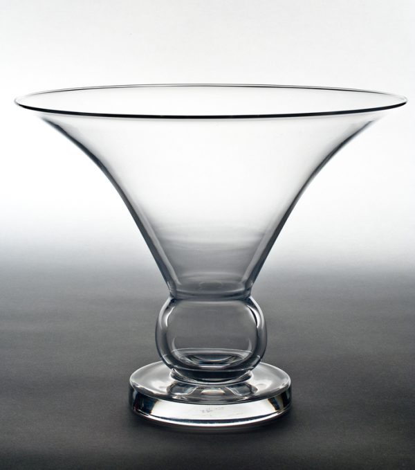 This vase was featured in the Steuben exhibition at the 1939 World’s Fair. A wide rim vase with bubble shape above wafer base.