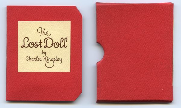 Red cardstock with same for bookcase cover. Story of a lost doll that was found in bad condition; but still considered the “Prettiest doll in the world.”