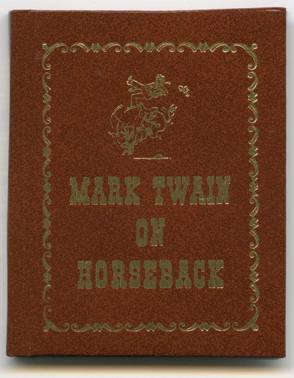 Soft-bound in leather with gilded letters and image of cowboy bronco buster. Harnsberger wrote about Mark Twain on horseback and riding a donkey.