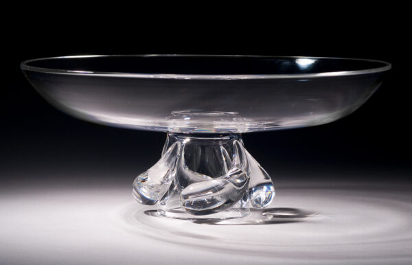 Conical-shaped bowl with applied gathers of glass in comma shape around the base leading to tapered column foot.