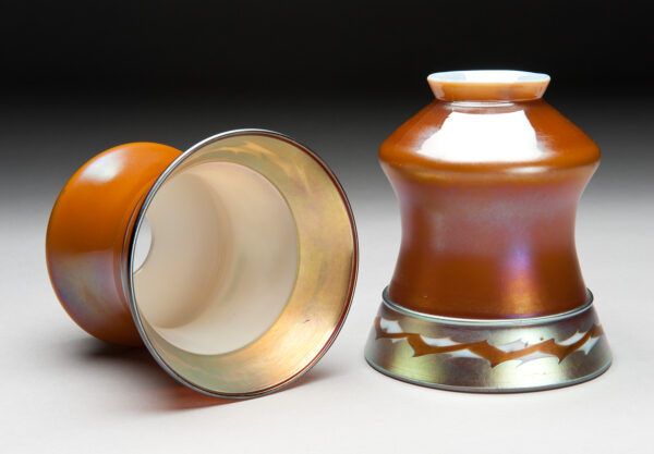 Brown Aurene decorated with a gold intarsia band of brown and white zig-zags
