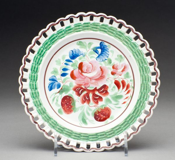 King's Rose pattern with blue flowers and strawberries. A green wicker border