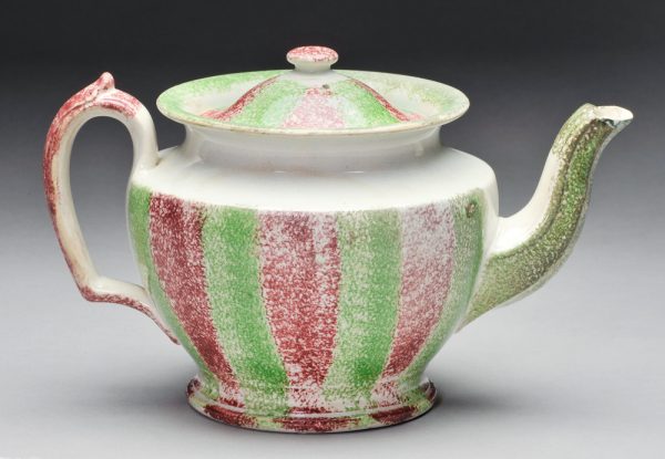 Spatterware teapot in red and green stripes.