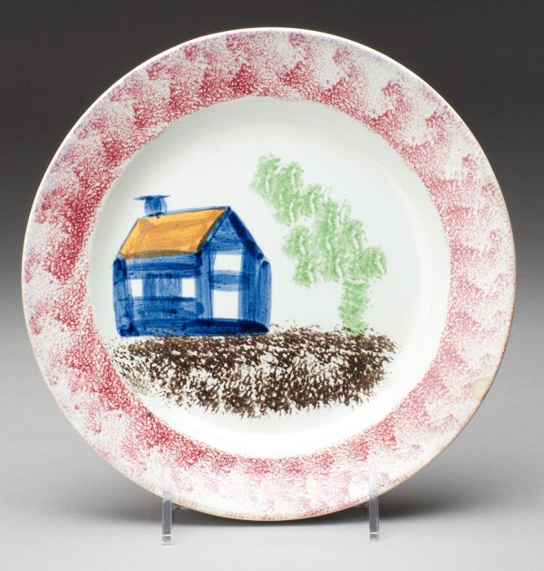 Spatterware plate, red with blue house, yellow roof, Schoolhouse pattern