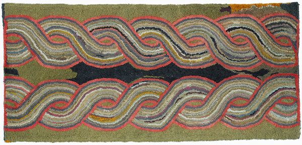 A hooked rug with two double braids in red, gray and black, on a brown field.