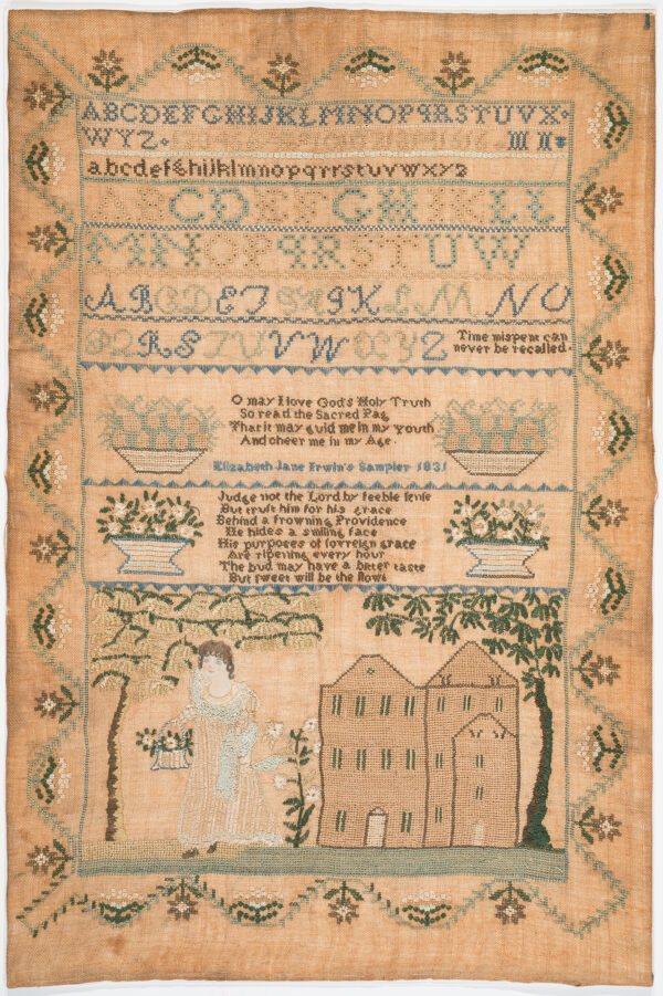 The sampler has several alphbets at top, two verses at center and at the bottom is a scene of a woman wearing white, a house and trees at each side.