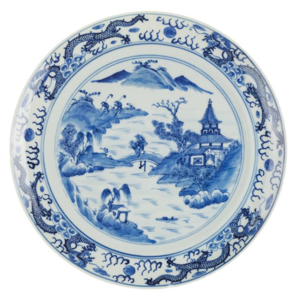 Plate in the Blue Willow pattern, hand painted.