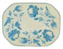 A small serving platter decorated with blue flowers and leaves on a cream background. the edge has a textured design
