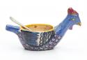 A blue chicken with red comb and wattle. A miniature silver spoon came with the egg holder.