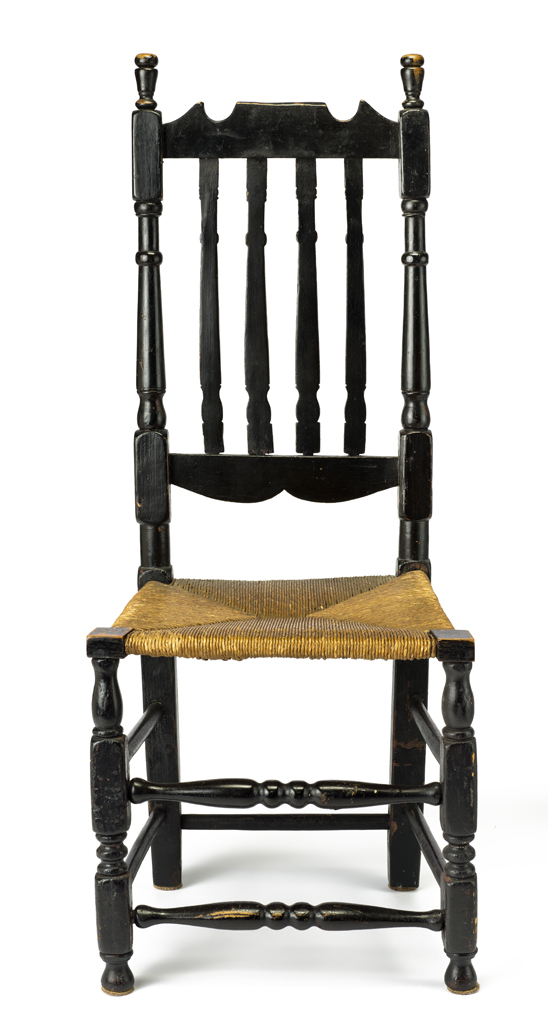 A banister side chair with double front rung, turned rungs and stiles, four slats and rush seat.