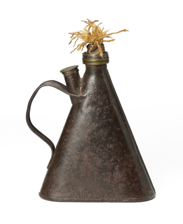 Flask shaped with strap handles with a spout for adding oil and a frayed wick.
