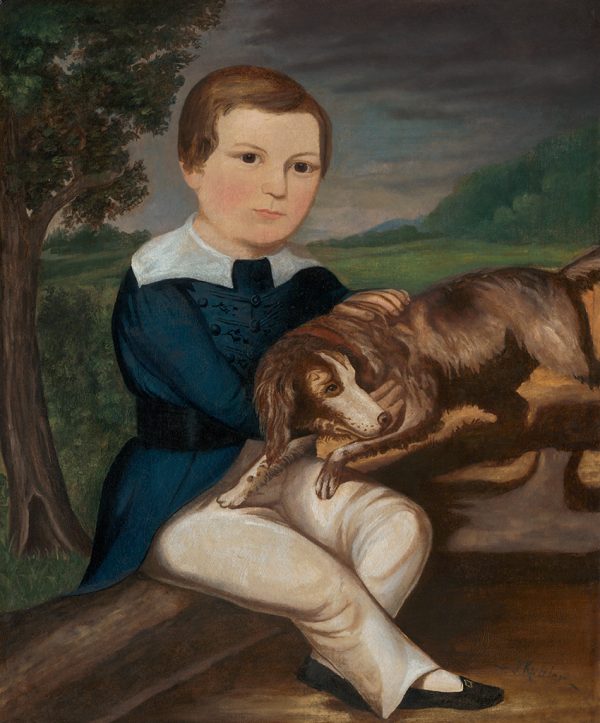 Dog lies with his head on the boy’s lap. There is a tree to the left. Philadelphia, Pennsylvania family.
