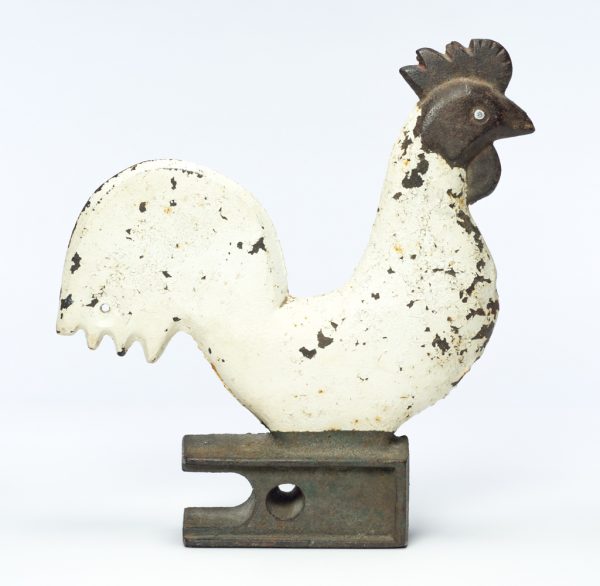 The rooster has a white body, black head. The base is not painted and has a hole for attaching to a pole.