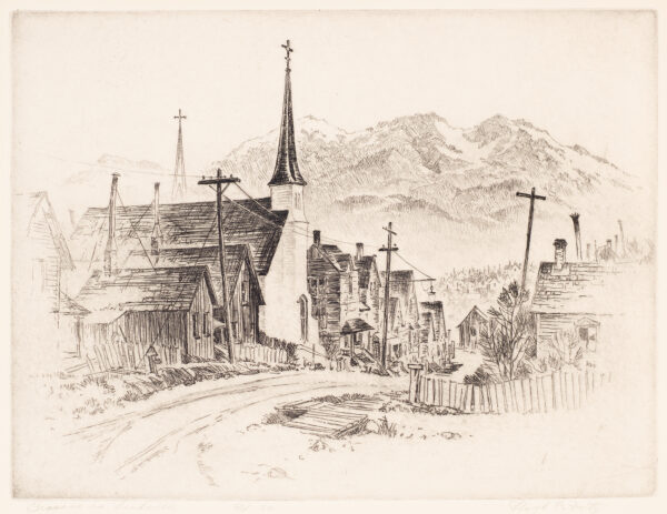 A road runs through a town, from bottom left, toward the center of the image. A large mountain range is behind the town. The town is on a hill shown by multiple houses overlapping, with telephone poles and a church with a cross on the top of the spire at center.