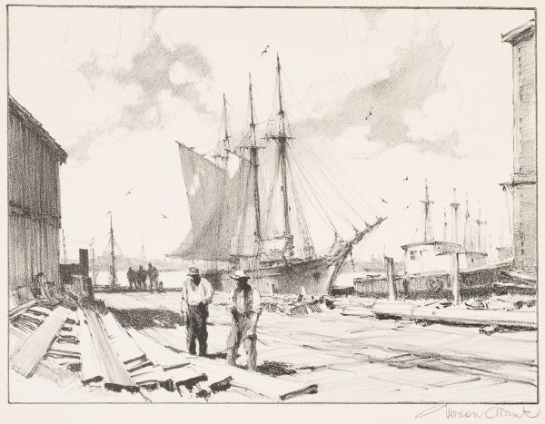 Two men stand before a pile of lumber with a dock behind. A tugboat and a sailing ship are docked.