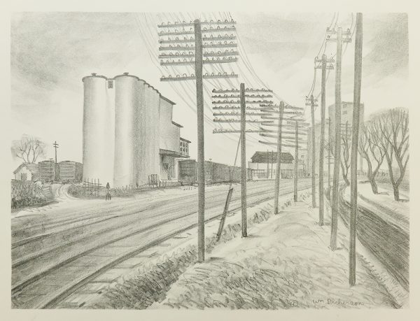 A train track runs from bottom left to center right, with a grain elevator on the left and center right. Telephone poles and a road with trees follow the tracks along the right.