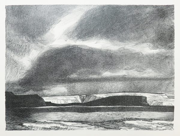 Most of the composition is sky, with dark clouds and rain in the distance. In the foreground are angular mountains in shadow and light, and flat rocks.