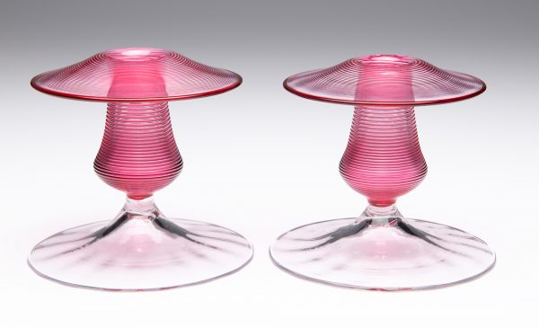 Two candlesticks shape 6593, in gold ruby with clear foot