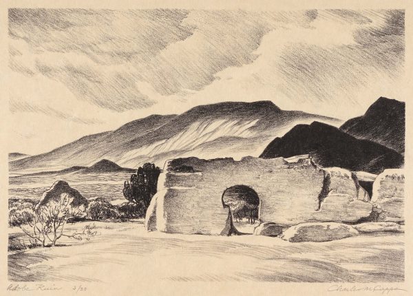 Adobe ruins are in the center with a low mountain in the background.