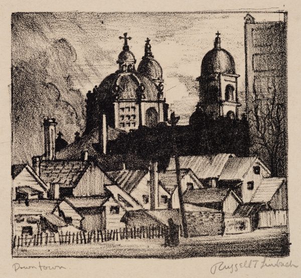 A church dome and two towers are toped by crosses, with houses in the foreground.